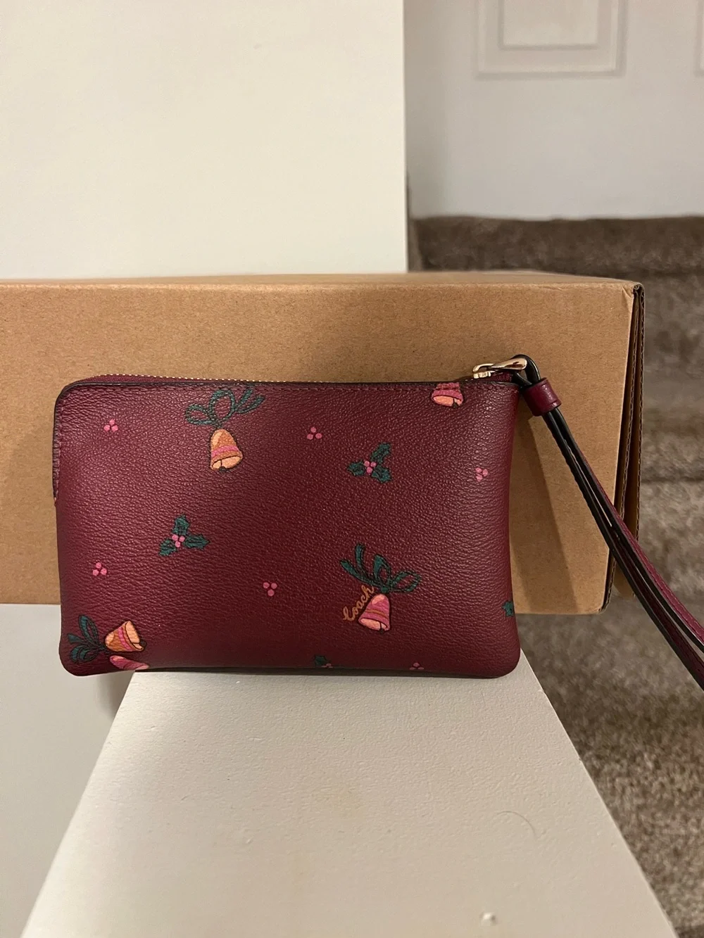 Coach Corner Zip Wristlet with Holiday Bells